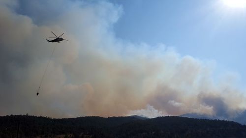 Low angle view of silhouette mountain against sky during sunset