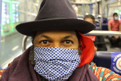Portrait of young man wearing hat