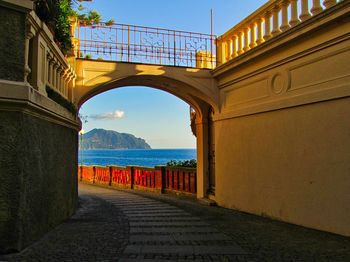 Bridge over sea against sky