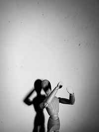 Girl playing with arms raised