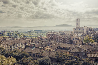 Perugia in a misty cloud and fog, an artistic vision elaborated at the computer of the city center