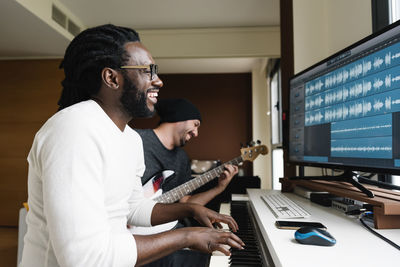 Musicians playing music in studio