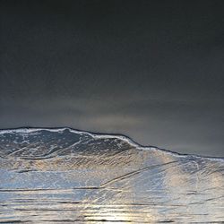 Scenic view of snowcapped mountain against sky