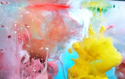 Close-up of colorful ink in water