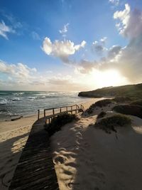 Scenic view of beach against sky