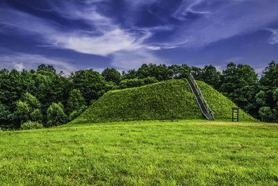Wooden upstairs to hill and the beautiful sky background