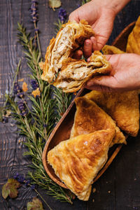 Close-up of hand holding bread