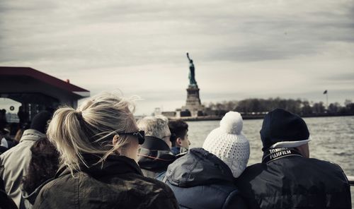 Tourists looking at eiffel tower