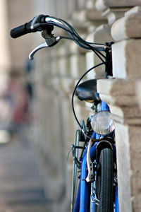 Close-up of bicycle on wall