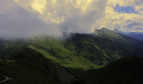 Scenic view of mountains against sky