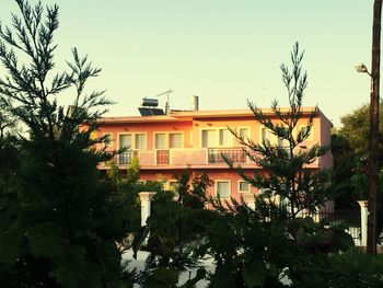 Houses against clear sky