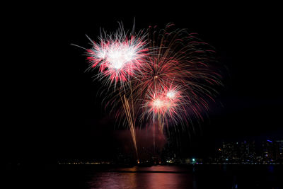 Firework display at night