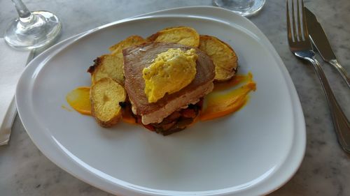 Close-up of served food in plate