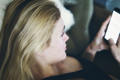 High angel view of woman using phone