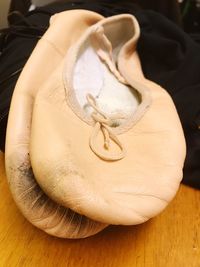 Close-up of shoes on table