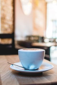 Coffee cup on table