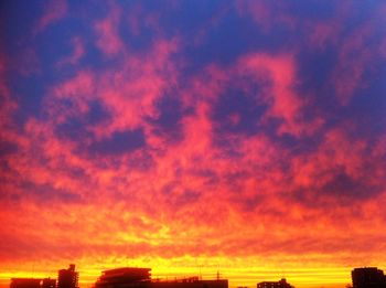 Low angle view of cloudy sky at sunset