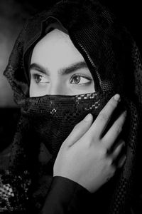 Close-up portrait of young woman