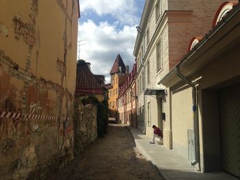 Narrow alley along buildings