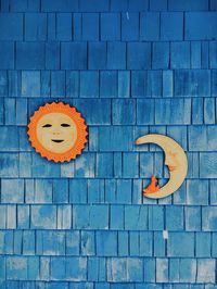 Smiley face on brick wall