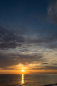 Scenic view of sea at sunset