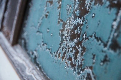 Close-up of snow on rusty metal
