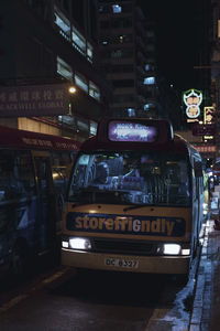 Cars on street in city at night