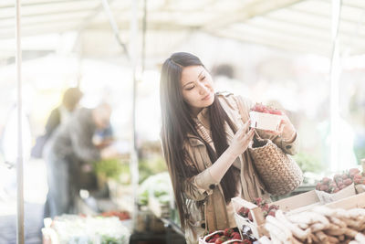 Young asia woman shopping at the market