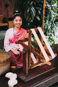 Portrait of a smiling young woman outdoors