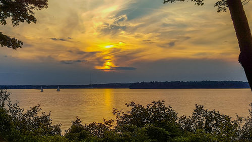 Scenic view of sea against sky during sunset