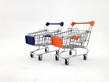 Bicycles on metal against white background