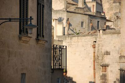 Street light by building in city