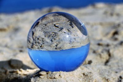 Close-up of blue sand on beach