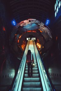 Low angle view of illuminated escalator