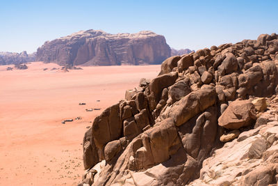 Rock formations in desert against clear sky