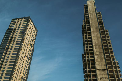 Low angle view of skyscrapers against sky