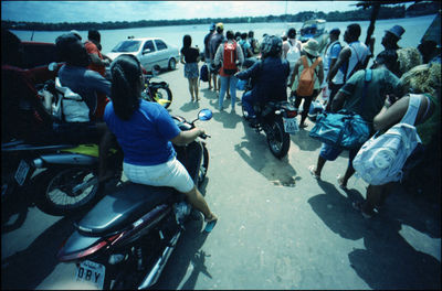 Group of people on street in city