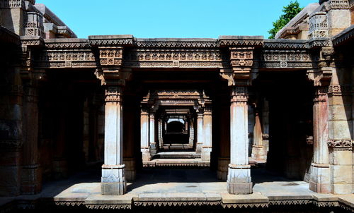 Corridor of adalaj stepwell against sky