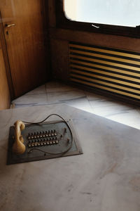 High angle view of electric lamp on floor at home