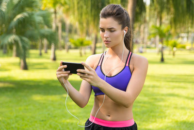 Young woman using mobile phone