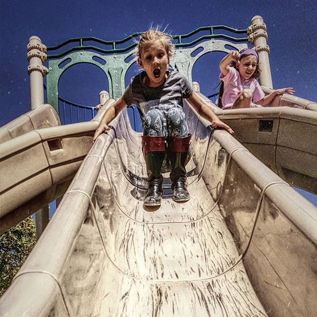 lifestyles, leisure activity, full length, low angle view, casual clothing, person, young adult, standing, portrait, looking at camera, front view, childhood, steps, built structure, railing, sitting, day, elementary age