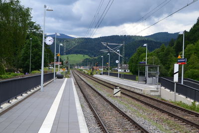 Railway tracks against sky