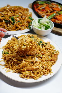 High angle view of noodles in plate on table
