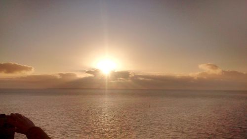 Scenic view of sunset over sea