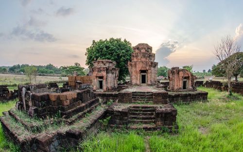 Old ruins of temple against cloudy sky