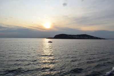 Scenic view of sea against sky during sunset