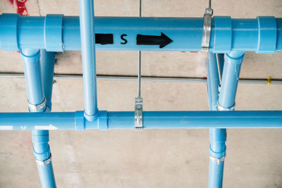 Sanitary work and installation of blue pvc pipes for the construction of residential buildings.
