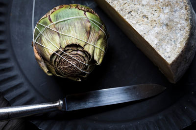 Close up of arrangement of artichoke and cheese