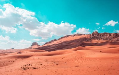 Scenic view of desert against sky