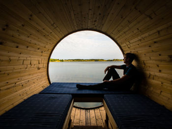 Man sitting on wall